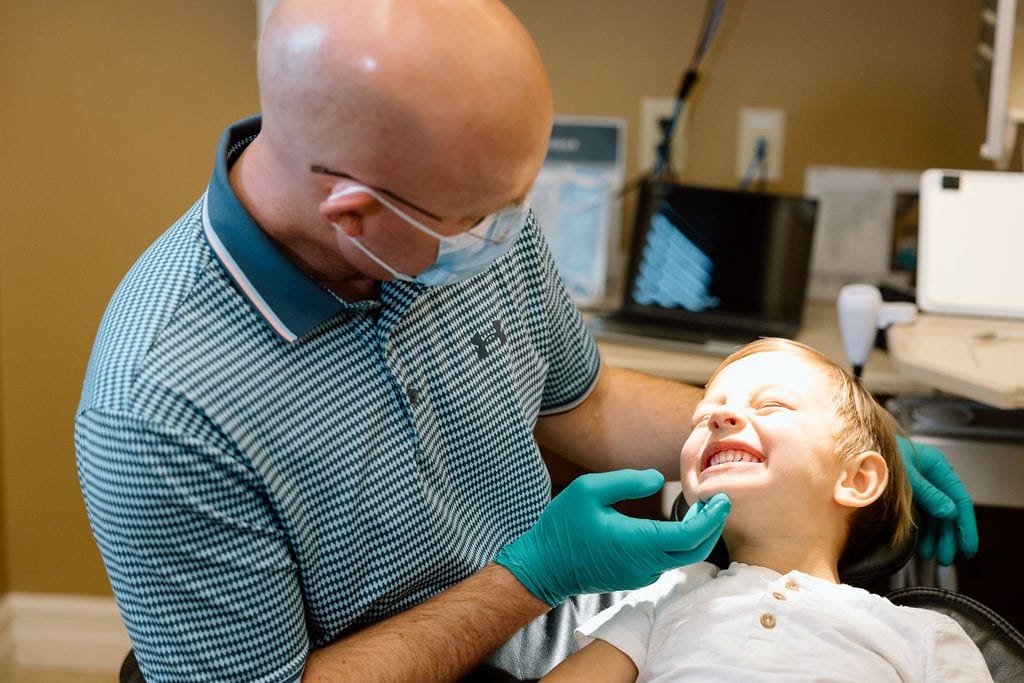 Dr. Watterson with young patient