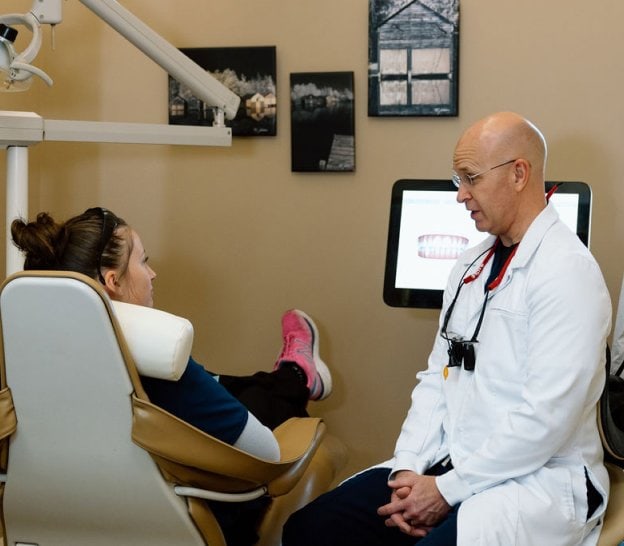 Dr. Watterson talking with patient